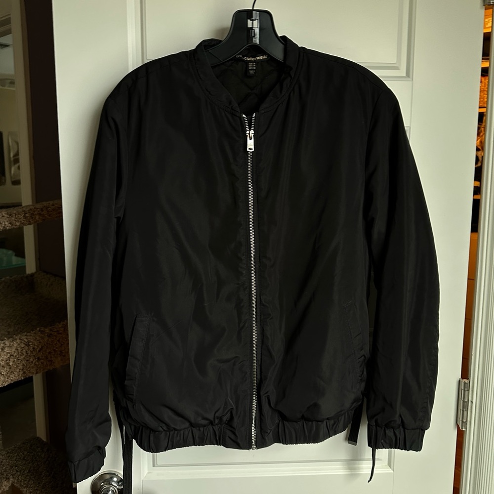 Black nylon bomber jacket with laced detail